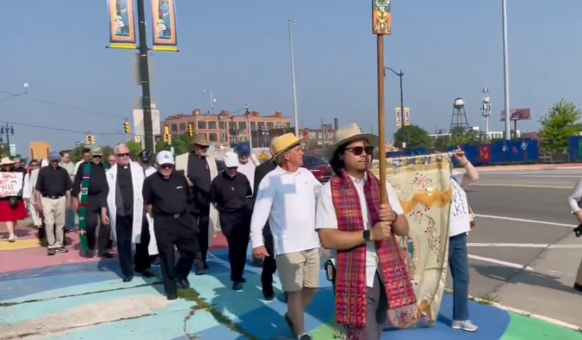 Detroit archbishop leads march to ICE office, calling for humane immigration practices