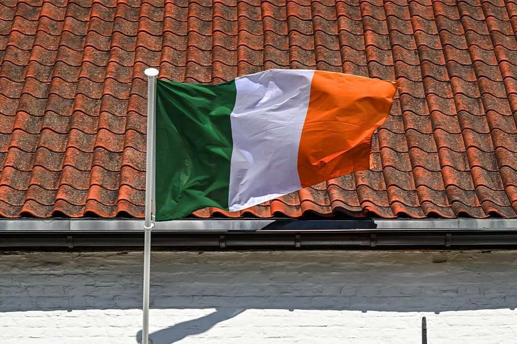 Families flee Northern Ireland Catholic neighborhoods amidst bomb threats, intimidation